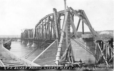 Photo of the Grand Trunk Pacific Railway bridge under construction, May 1914. 