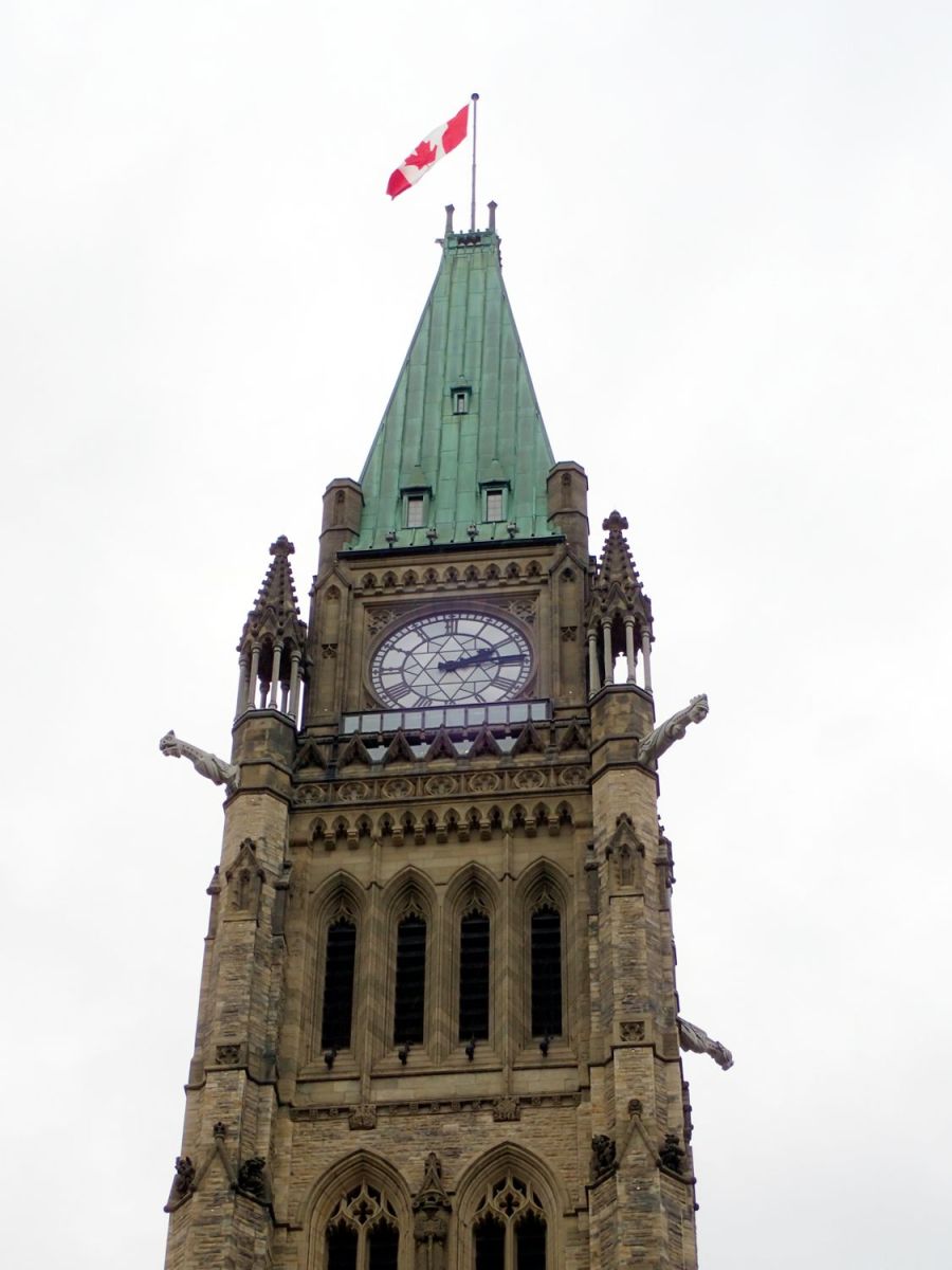 Photo of Peace Tower with gargoyles protruding.