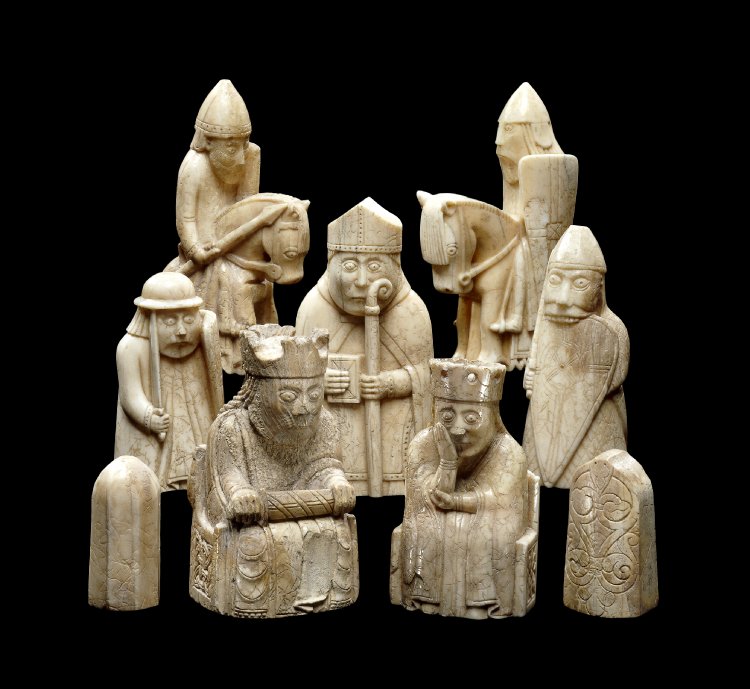 Photo of a collection of Lewis chessmen.
